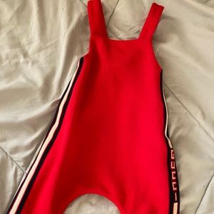 Red Gucci jumpsuit for infant